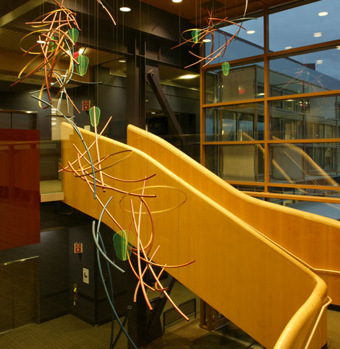 ARTIST: Koryn Rolstad. The commissioned lyrical mobile animates the atrium with colors and forms.