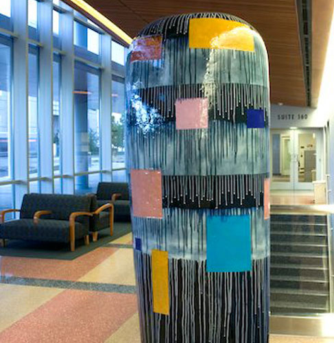 World-renowned artist Jun Kaneko’s Dango ceramic stands tall in the entry to the clinic.